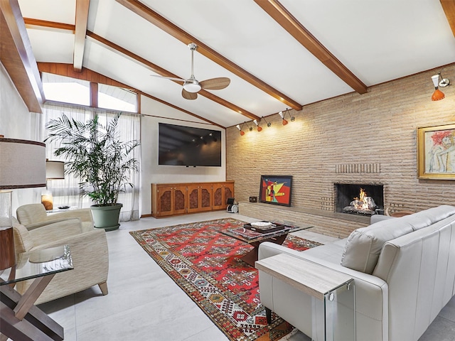 1102 N Graves St, Mckinney, TX 75069 - living room featuring ceiling fan, beamed ceiling, a fireplace, and high vaulted ceiling