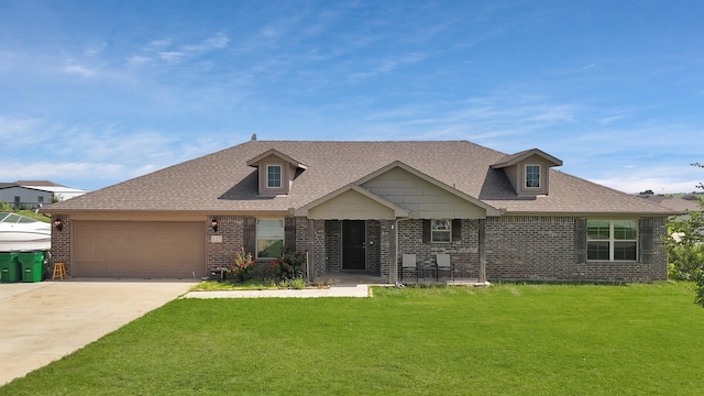 127 Pasture Ln, Decatur, TX 76234 - view of front of property featuring driveway, brick siding, an attached garage, and a front yard