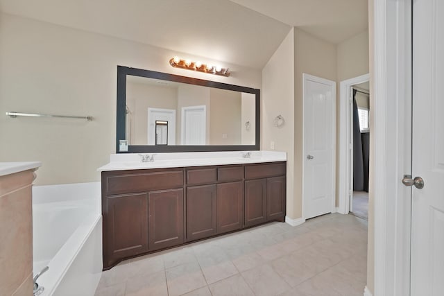 127 Pasture Ln, Decatur, TX 76234 - full bath featuring double vanity, a bath, and tile patterned floors