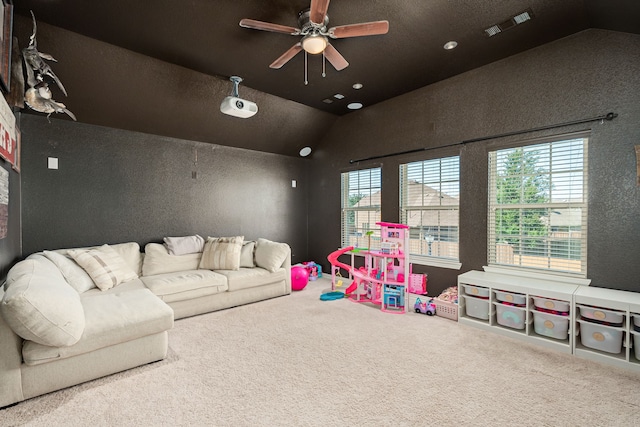 2209 Willard Dr, Mckinney, TX 75072 - rec room featuring lofted ceiling, carpet, ceiling fan, healthy amount of natural light, and a textured wall