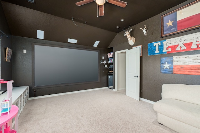 2209 Willard Dr, Mckinney, TX 75072 - home theater featuring carpet, a ceiling fan, vaulted ceiling, and a textured wall
