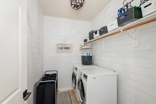 2209 Willard Dr, Mckinney, TX 75072 - washroom with independent washer and dryer, wooden walls, and light tile patterned floors
