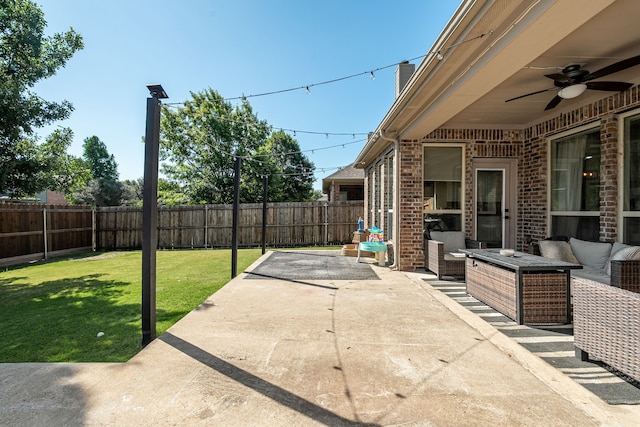2209 Willard Dr, Mckinney, TX 75072 - fenced backyard featuring ceiling fan, a patio, and an outdoor living space