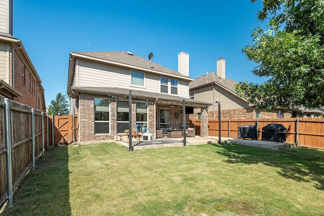 2209 Willard Dr, Mckinney, TX 75072 - rear view of house with a patio area, a fenced backyard, brick siding, a gate, and a chimney