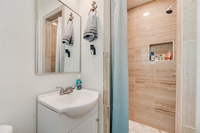 2315 Cardinal Ln, Garland, TX 75042 - bathroom with a stall shower and vanity