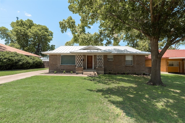 2315 Cardinal Ln, Garland, TX 75042 - view of front of house featuring brick siding and a front lawn