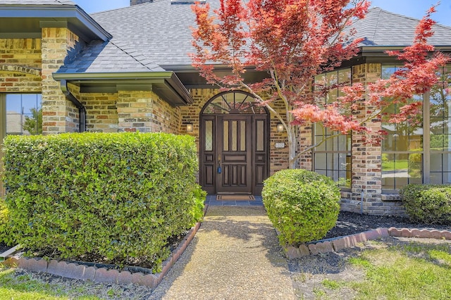 6226 Liberty Hl, Dallas, TX 75248 - property entrance featuring roof with shingles and brick siding