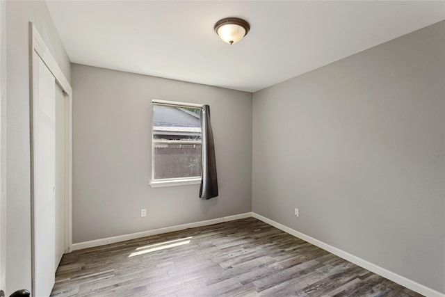 2628 Belhaven Dr, Mesquite, TX 75150 - unfurnished bedroom featuring wood finished floors and a closet
