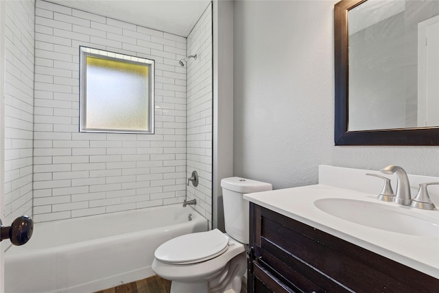2628 Belhaven Dr, Mesquite, TX 75150 - bathroom featuring vanity, tub / shower combination, and wood finished floors
