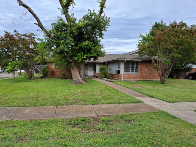12634 Templeton Trl, Farmers Branch, TX 75234 - view of front of house featuring brick siding and a front lawn