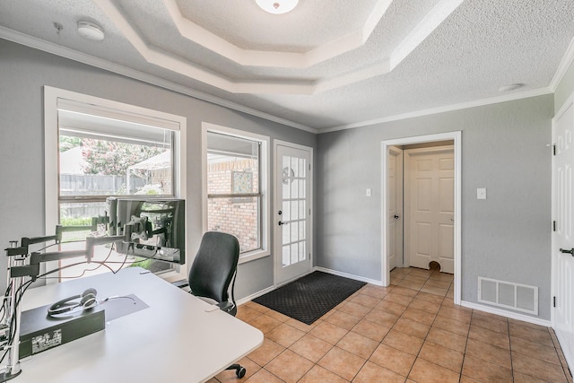 6215 Suffolk Dr, Arlington, TX 76001 - home office with light tile patterned floors, a textured ceiling, ornamental molding, and a raised ceiling