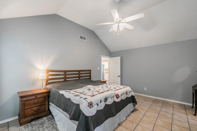 6215 Suffolk Dr, Arlington, TX 76001 - bedroom with vaulted ceiling, light tile patterned flooring, and ceiling fan