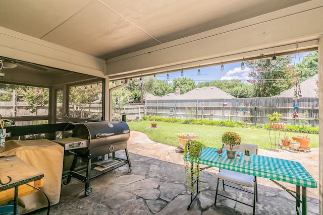 6215 Suffolk Dr, Arlington, TX 76001 - fenced backyard with a patio area and outdoor dining space