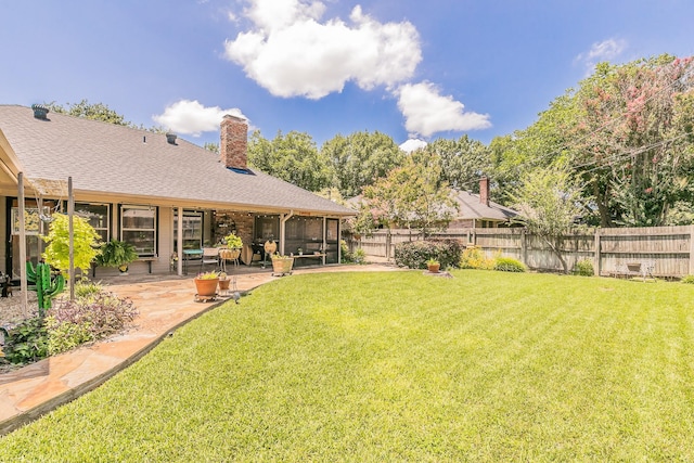 6215 Suffolk Dr, Arlington, TX 76001 - fenced backyard with a sunroom and a patio area