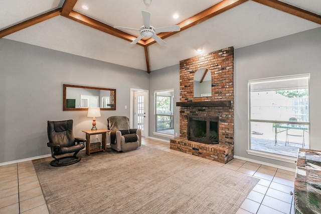 6215 Suffolk Dr, Arlington, TX 76001 - tiled living area with a ceiling fan, healthy amount of natural light, and a brick fireplace