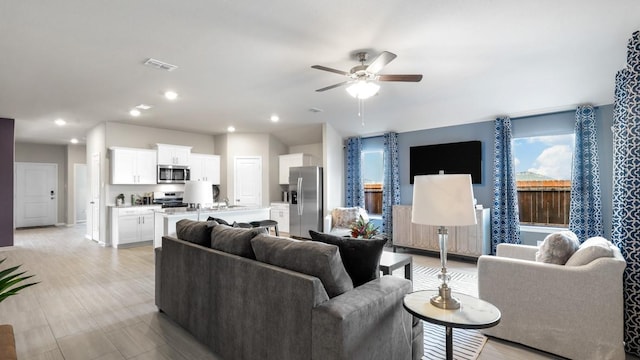 9453 Mint Hill Dr, Fort Worth, TX 76108 - living room featuring a ceiling fan and recessed lighting