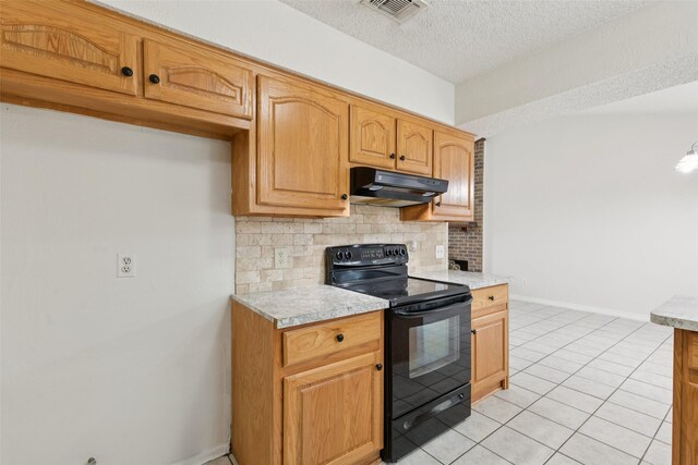 2017 Jessie Pl, Edgecliff Village, TX 76134 - kitchen featuring black range with electric cooktop, under cabinet range hood, light countertops, a textured ceiling, and backsplash