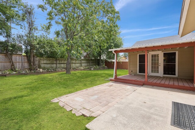 2017 Jessie Pl, Edgecliff Village, TX 76134 - fenced backyard with a wooden deck and a patio