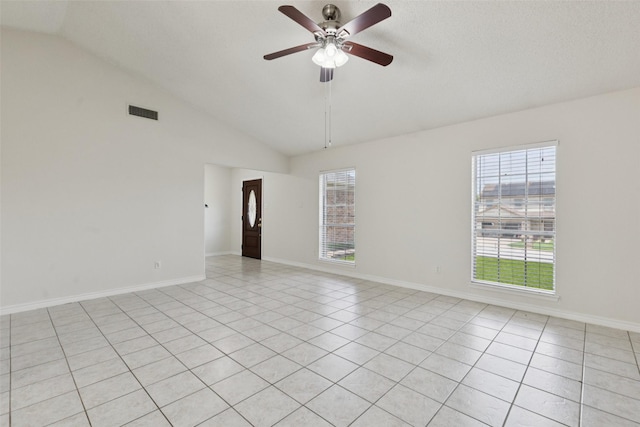 2017 Jessie Pl, Edgecliff Village, TX 76134 - unfurnished room with vaulted ceiling, light tile patterned floors, and a ceiling fan