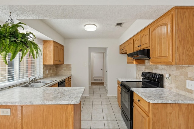 2017 Jessie Pl, Edgecliff Village, TX 76134 - kitchen with black appliances, under cabinet range hood, light countertops, backsplash, and light tile patterned floors