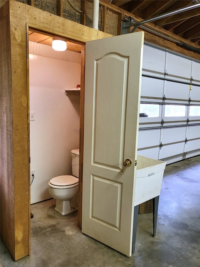 697 Highland Crest Dr, Hurst, TX 76054 - bathroom featuring concrete flooring and toilet