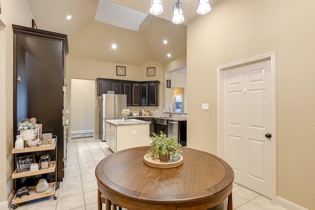 1970 Lake Forest Dr, Rockwall, TX 75087 - dining room featuring light tile patterned flooring and high vaulted ceiling