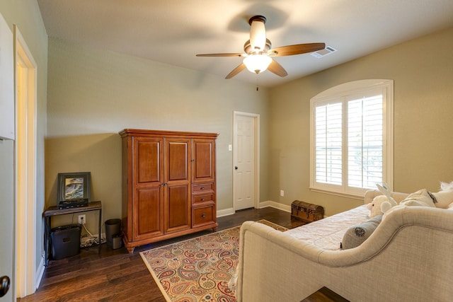 1970 Lake Forest Dr, Rockwall, TX 75087 - living area with dark wood-type flooring and a ceiling fan