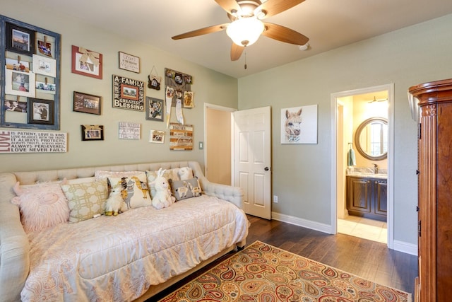 1970 Lake Forest Dr, Rockwall, TX 75087 - bedroom featuring wood finished floors, ceiling fan, and ensuite bathroom