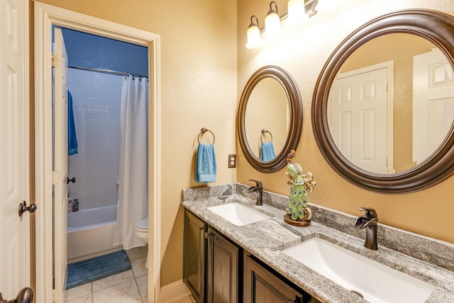 1970 Lake Forest Dr, Rockwall, TX 75087 - bathroom with double vanity, tile patterned floors, and shower / tub combo