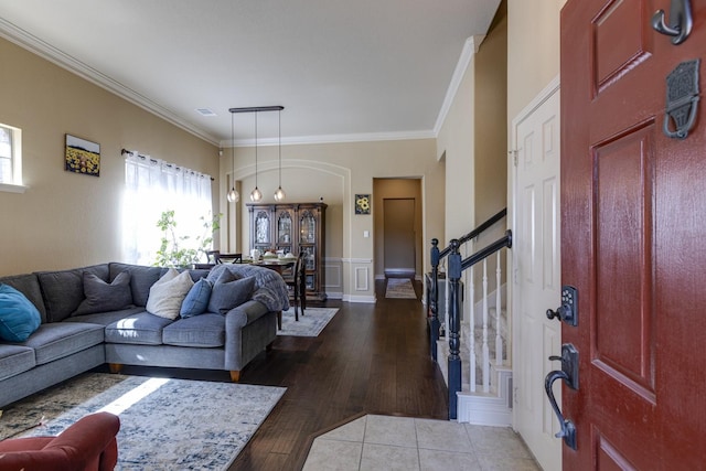 1970 Lake Forest Dr, Rockwall, TX 75087 - living room featuring crown molding, wood finished floors, and stairway
