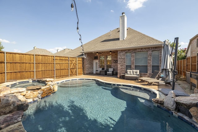 1970 Lake Forest Dr, Rockwall, TX 75087 - view of swimming pool featuring a fenced backyard, an outdoor living space, a patio, and a pool with connected hot tub