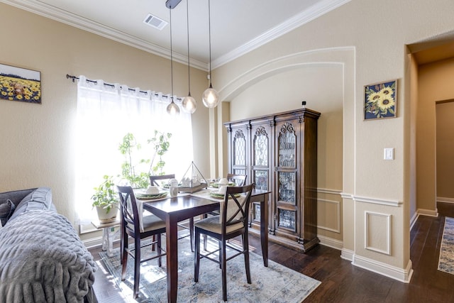 1970 Lake Forest Dr, Rockwall, TX 75087 - dining room with wood finished floors and crown molding