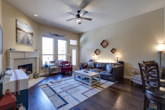 1970 Lake Forest Dr, Rockwall, TX 75087 - living room featuring ceiling fan, wood finished floors, and a tile fireplace