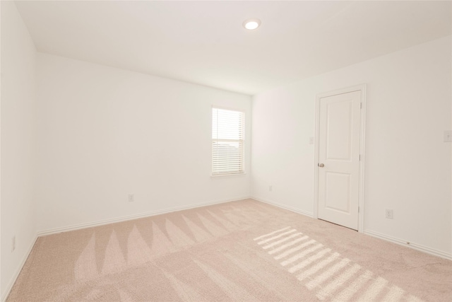 219 Autumn Sage Ln, Princeton, TX 75407 - spare room featuring light colored carpet and recessed lighting