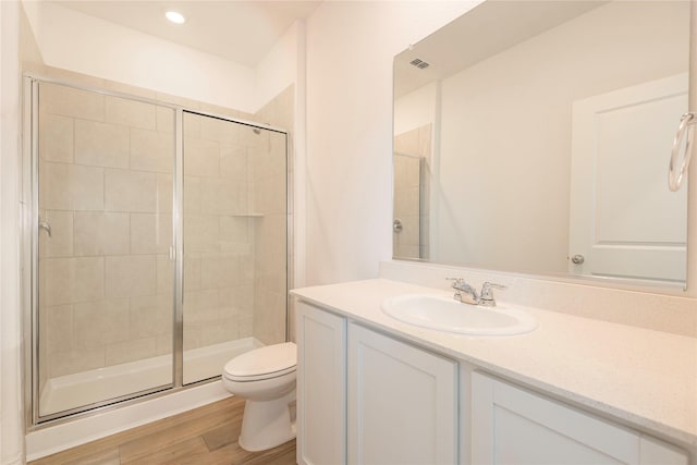 219 Autumn Sage Ln, Princeton, TX 75407 - full bathroom featuring vanity, a shower stall, and wood finished floors