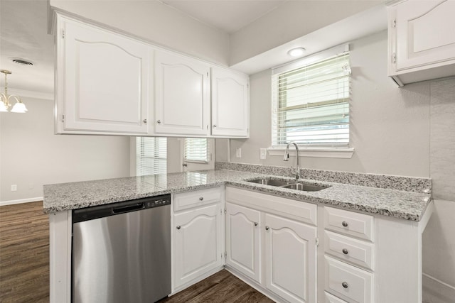 2405 Patricia Ln, Garland, TX 75041 - kitchen featuring dishwasher, dark wood-type flooring, white cabinetry, a peninsula, and crown molding