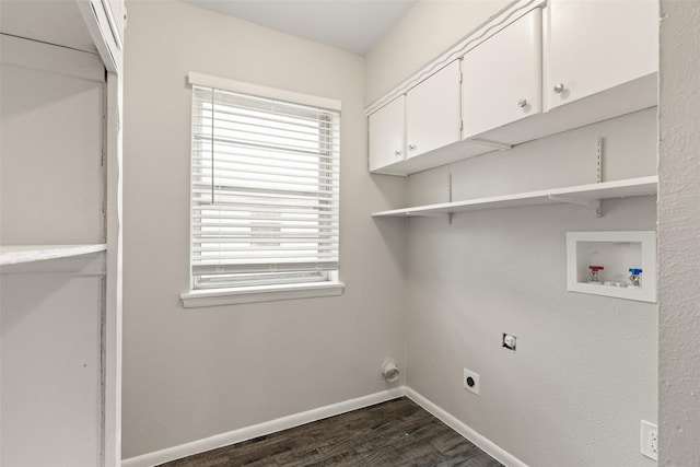 2405 Patricia Ln, Garland, TX 75041 - laundry area with electric dryer hookup, washer hookup, dark wood-style floors, and cabinet space
