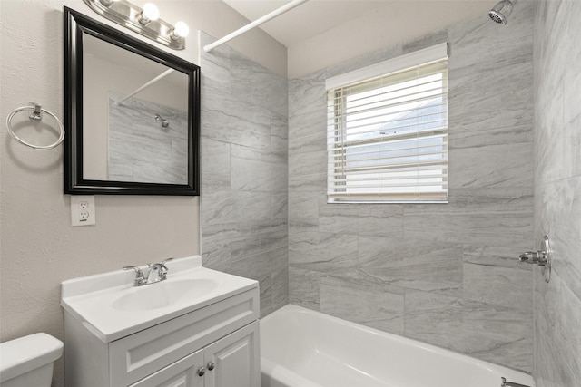 2405 Patricia Ln, Garland, TX 75041 - bathroom featuring vanity and washtub / shower combination