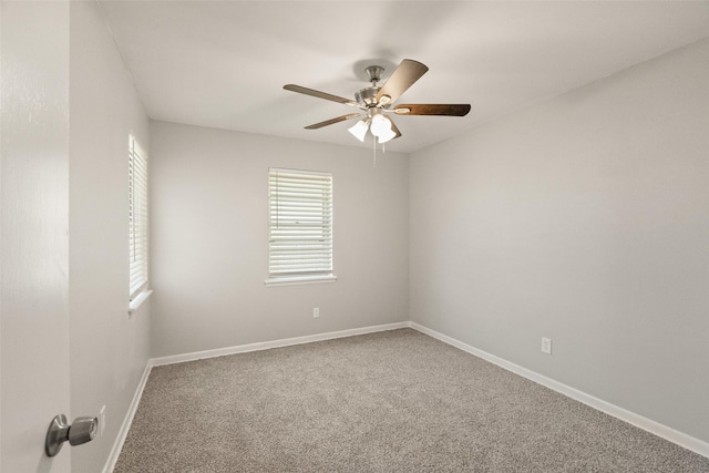 2405 Patricia Ln, Garland, TX 75041 - carpeted empty room featuring plenty of natural light and a ceiling fan
