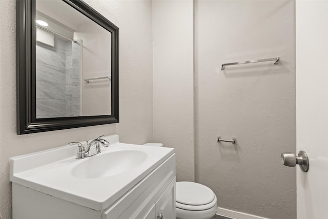 2405 Patricia Ln, Garland, TX 75041 - bathroom featuring vanity and toilet