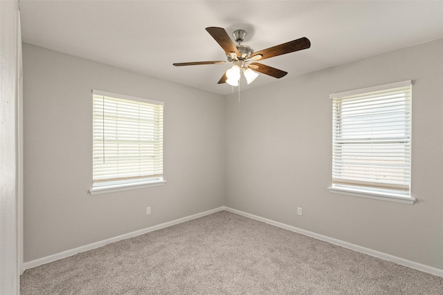 2405 Patricia Ln, Garland, TX 75041 - carpeted empty room featuring healthy amount of natural light and ceiling fan