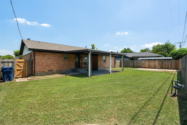 2405 Patricia Ln, Garland, TX 75041 - back of property with brick siding, a patio, a fenced backyard, crawl space, and a gate