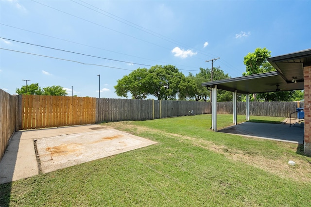 2405 Patricia Ln, Garland, TX 75041 - fenced backyard featuring a patio