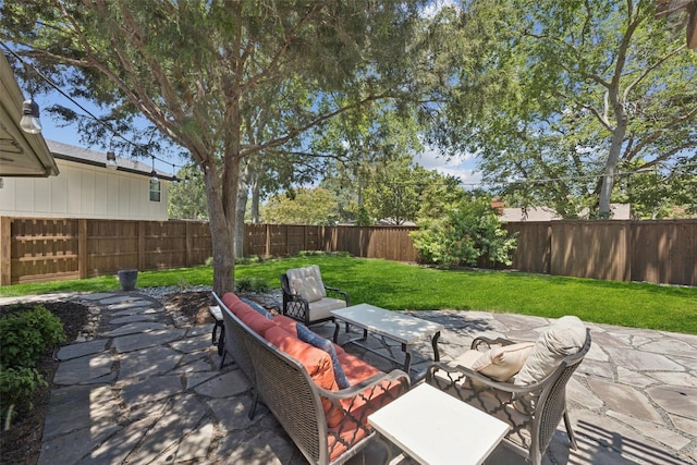 2924 Whitemarsh Cir, Richardson, TX 75080 - fenced backyard with a patio and an outdoor living space
