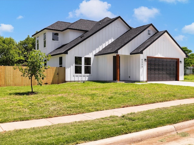 5223 Willie St, Fort Worth, TX 76105 - modern farmhouse style home with roof with shingles, an attached garage, driveway, and board and batten siding