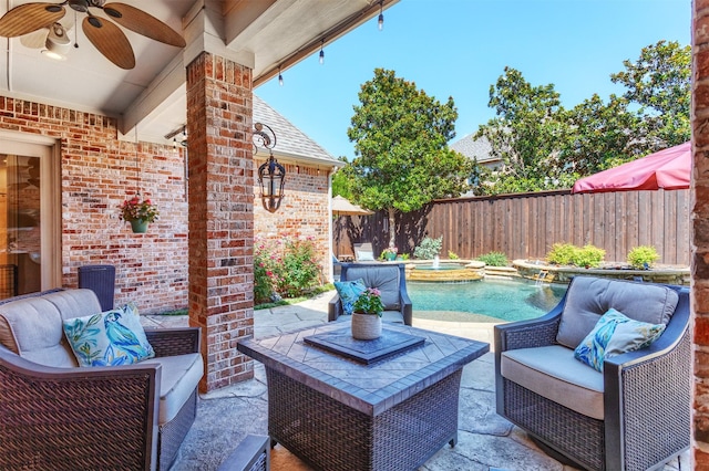 11640 Mesa Verde Dr, Frisco, TX 75033 - fenced backyard featuring ceiling fan, outdoor lounge area, a patio, and a pool with connected hot tub