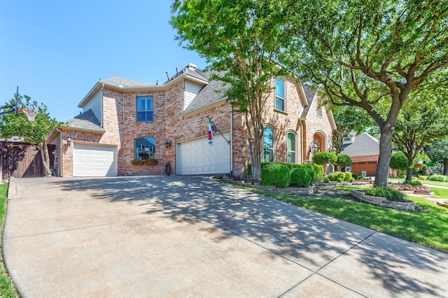 11640 Mesa Verde Dr, Frisco, TX 75033 - traditional home with brick siding, driveway, an attached garage, and roof with shingles