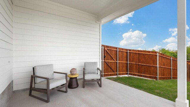 6628 Windfall Dr, Fort Worth, TX 76135 - fenced backyard with a patio area