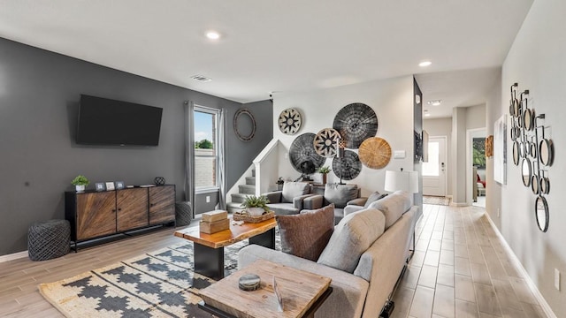 6628 Windfall Dr, Fort Worth, TX 76135 - living area featuring stairs, wood tiled floors, and recessed lighting
