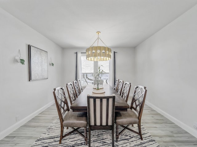 412 Navo Rd, Little Elm, TX 75068 - dining space with a chandelier and light wood-type flooring